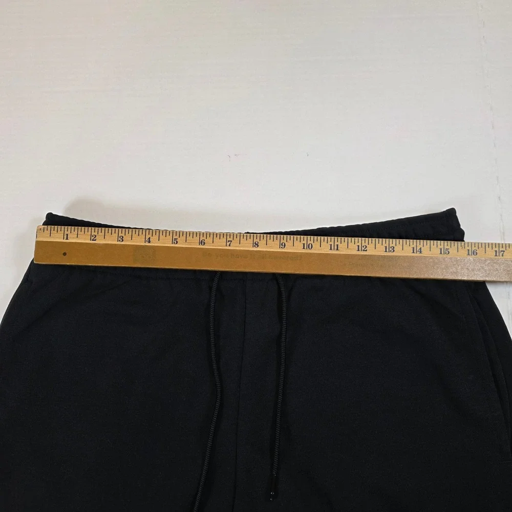 ⁠Nike Air Jordan Jumpman Logo Men's Fleece Shorts Black White AQ3115-010 Size M⁠